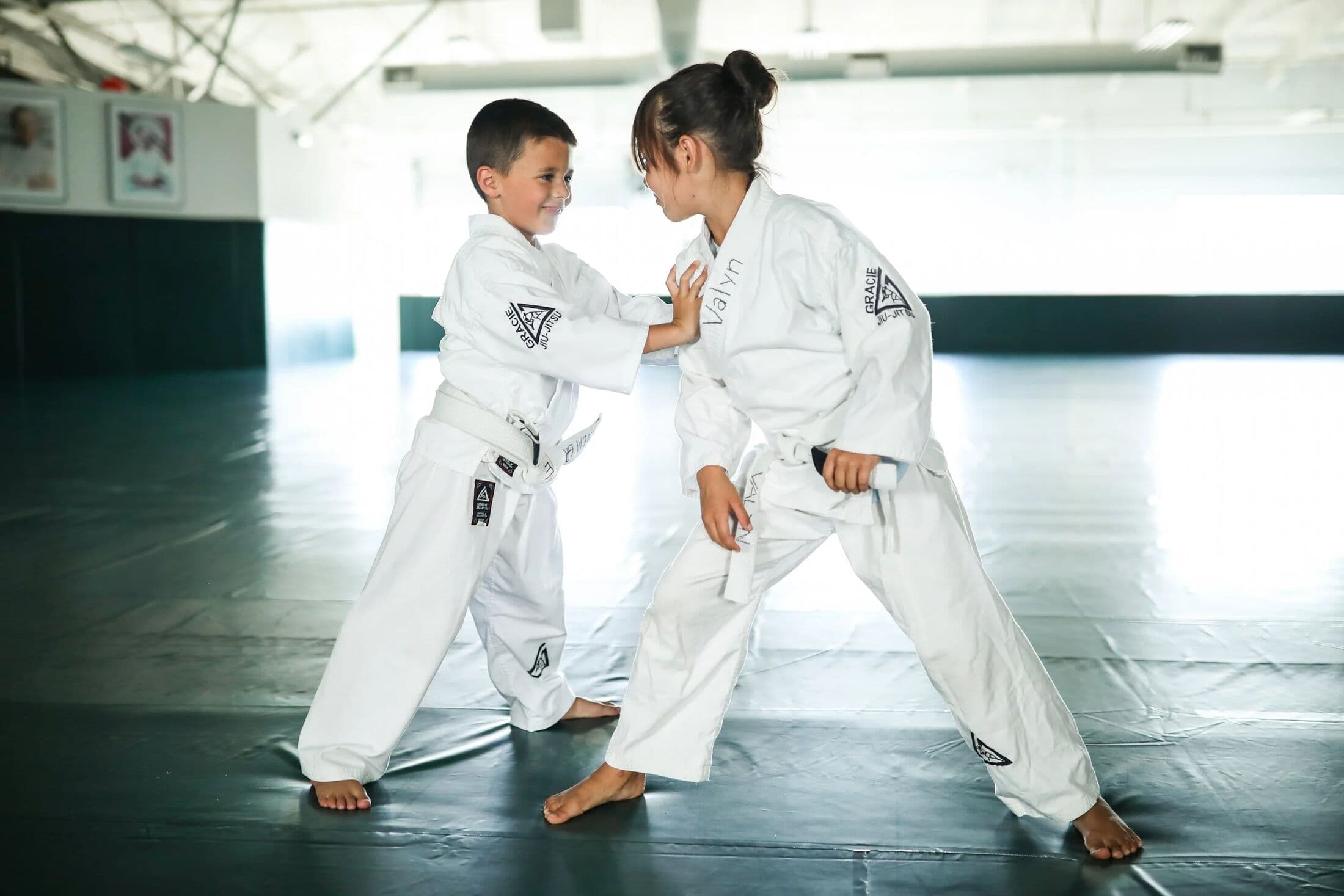 Kids facing off in a self-defense drill